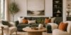 Modern living room illustrating the 60-30-10 rule of design with warm neutral walls, a deep olive green sofa, and terracotta accent pillows.